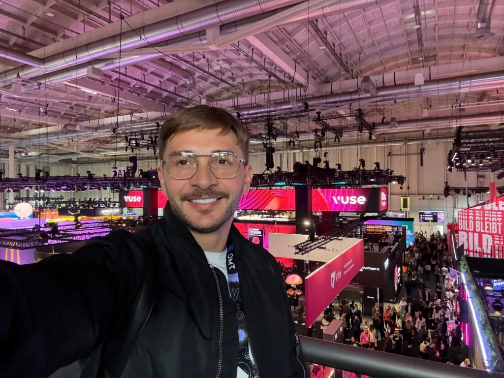 Dexis team member at a technology exhibition